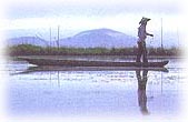 Fisherman near a phum on the Loktak